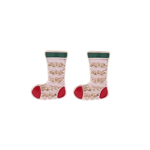 Detailed view of Christmas stocking stud earrings with festive red and green enamel coating