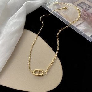 Gold star-textured sea star pendant necklace with mixed beaded and link chain