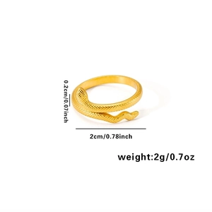 Macro shot of gold snake ring with scale texture showing 2cm diameter and weight specs