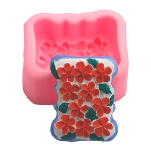 Pink floral silicone mold for handmade soap and chocolate with embossed flower design