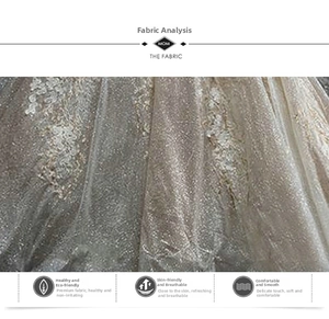 Detailed texture of champagne gold bridal fabric with breathable and soft silk finish