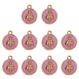Group of ten gold-plated bee charms with pink enamel details for DIY jewelry making