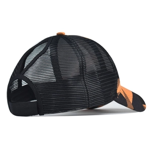 Detail of breathable mesh back and V-shaped ponytail opening on tie-dye baseball cap