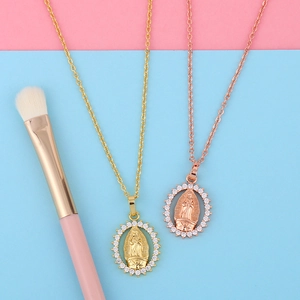 Virgin Mary oval pendant necklaces in gold and rose gold with sparkling zircon stones