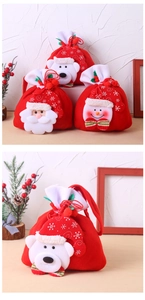 Detail of Christmas candy bags featuring Santa and snowman appliques with drawstrings