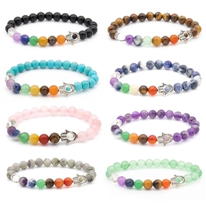 Detailed grid view of eight chakra bracelets with Hamsa Hand charms and natural stones