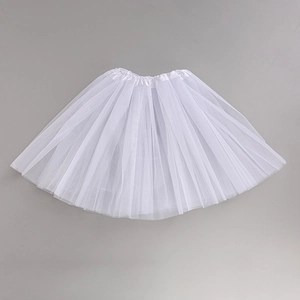 Detailed view of elastic waistband and multi-layer white mesh fabric on a tutu skirt