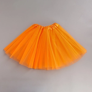 Detailed view of an orange tutu skirt with three-layer mesh and smooth satin waistband
