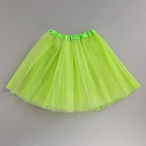 Detailed close-up of neon green tulle tutu skirt featuring an elastic waistband