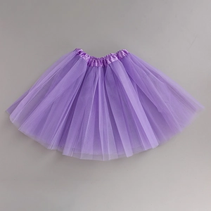 Detail of purple tulle tutu skirt featuring multi-layered mesh and elastic silk waistband