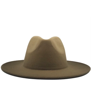 Detailed texture of two-tone wool felt fedora with a classic wide brim and wavy top