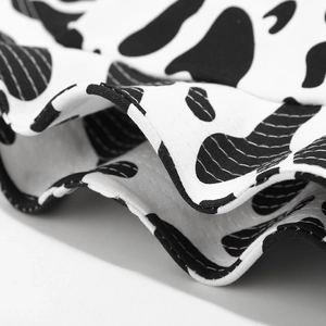 Foldable cartoon cow print bucket hat with shapable brim and fine stitching detail