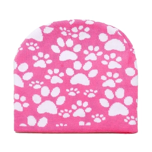 Detailed close-up of pink knit beanie featuring white animal paw print patterns