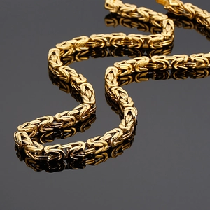 Golden Byzantine style titanium steel chain necklace with bold textured woven links