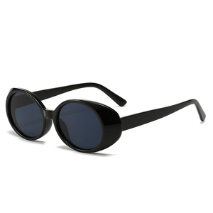 Retro oval sunglasses with thick black frame and grey lenses for a minimalist fashion look