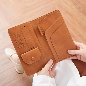Brown leather travel passport wallet with RFID protection and multi-card slots design
