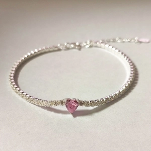 Detail of S925 silver tennis bracelet with pink heart zircon and adjustable lobster clasp