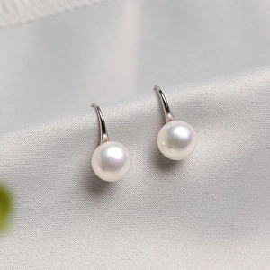 Elegant freshwater white pearl earrings with sterling silver high-heel style hooks