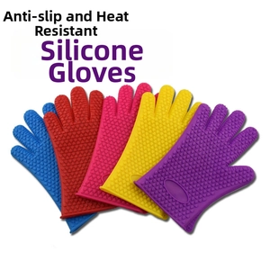 Close-up of five heat-resistant silicone gloves with non-slip heart patterns in various colors