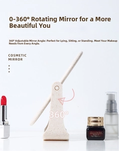Close-up of beige oval desktop cosmetic mirror with 360 degree rotation function