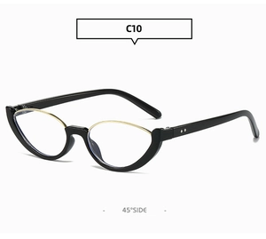 Dettaglio occhiali da sole ovali cat-eye con montatura nera e ponte in oro