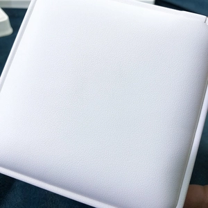 White square PU leather jewelry gift box with lychee grain texture and stitching details
