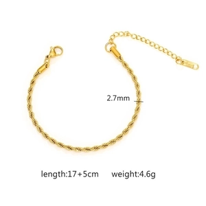 Detail of 2.7mm golden stainless steel wheat chain bracelet with lobster clasp and extender