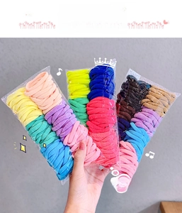 Detail of multi-color elastic hair ties set in assorted vibrant candy colors