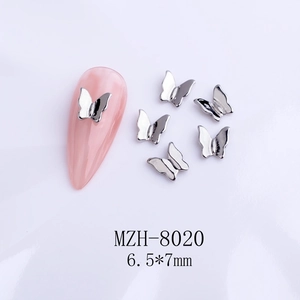 Detailed view of silver bow-knot nail charms with model MZH-8020 size 6.5x7mm