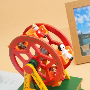 Handcrafted wooden Christmas Ferris wheel music box with colorful figurines and bears