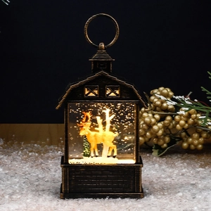 Close-up of a bronze vintage Christmas lantern with golden reindeer and forest scene