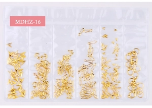 Macro view of six-grid gold nail charms with anchors and geometric shapes, item MDHZ-16