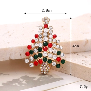 Christmas tree brooch pin in gold alloy with colorful rhinestones measuring 2.8x4cm