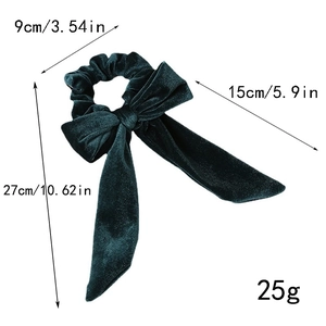 Detailed view of dark green velvet bow hair tie with dimensions and weight data