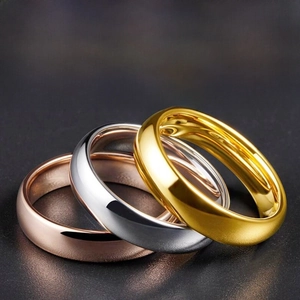 Three-color stack of polished 4mm stainless steel rings in gold, silver and rose gold
