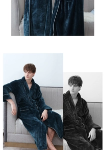 Close-up of thick flannel bathrobe featuring contrast piping and a matching waist belt