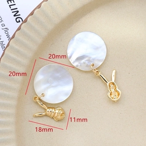 Detail of mother of pearl rabbit drop earrings in gold plated finish for DIY jewelry