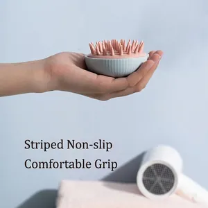 Pink and blue silicone hair scalp massager brush with ergonomic non-slip stripe grip