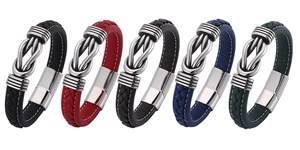 Close-up of five men's braided leather bracelets with unique metal magnetic clasps