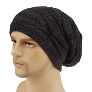 Side view of dark coffee cable knit slouchy beanie on a display head model