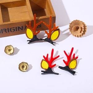 Trois barrettes en peluche bois de renne avec oreilles jaunes en rouge et marron