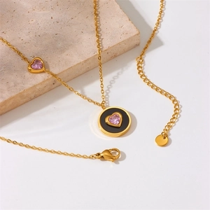 Gold stainless steel chain necklace with black pendant and pink heart cubic zirconia
