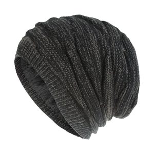 Detailed view of the thick gray fleece lining and diamond knit pattern on winter beanie