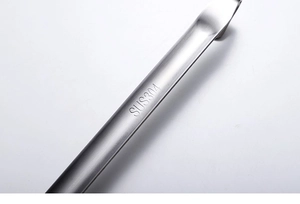 Detail showing SUS304 stainless steel logo engraved on a thick metal funnel handle