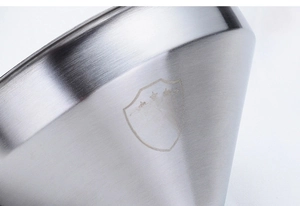 Macro shot of food-grade 304 stainless steel funnel with brushed metal texture