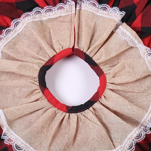 Rustic Christmas tree skirt with red buffalo plaid edge, burlap layers and white lace detail