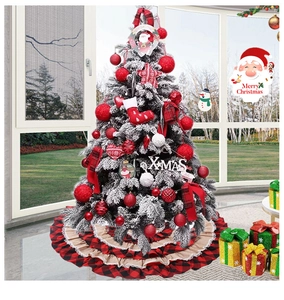 Close-up of red and black buffalo plaid Christmas tree skirt with ruffled beige tiers
