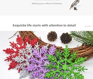 Close-up of glittery snowflake ornaments in red, silver, purple, and green for Christmas decor