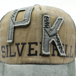 Vintage washed baseball cap featuring PK patch embroidery and Silverhill printed text