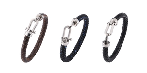 Three braided leather bracelets with horseshoe buckles in black and brown finish